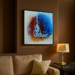 Arabic calligraphy artwork of the word "Subhan" meaning Sublime or Glorious, in white script over a vibrant abstract background of blue, red, orange, and white, PN-022 by Art Fantasy BD, perfect for modern and spiritual home decor.