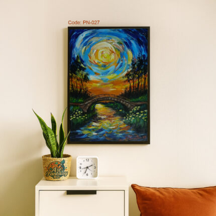 Surreal swirling sky in blue, yellow, and orange over a stone bridge crossing a reflective river, surrounded by lush green trees, PN-027 dreamscape painting by Art Fantasy BD, perfect for modern and cozy home decor.